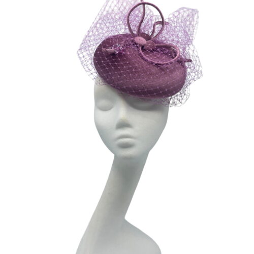 Stunning dusky pink velvet headpiece with structured swirl and hand beaded detail.